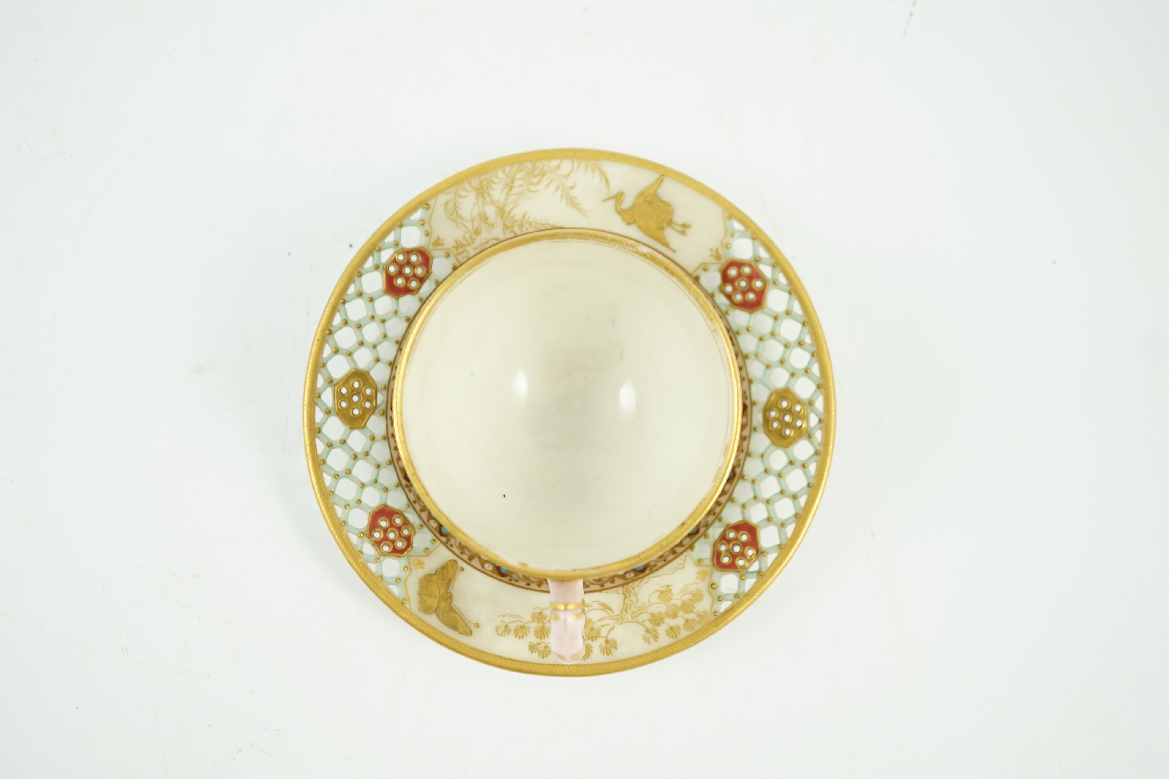 A Royal Worcester reticulated miniature cabinet cup and saucer, late 19th century